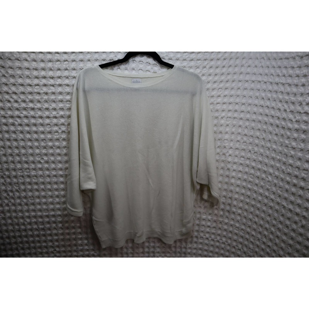 Off white 3/4 sleep thin sweater size XL signs of wear. Small holes in hemline